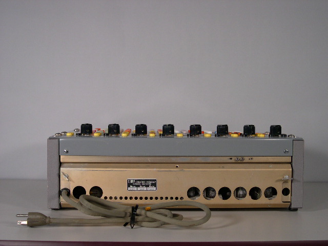  image of Back of the Donner 3500 analog computer.  You can see the manufacturer's tag and some extra large holes to let the heat dissipate. 