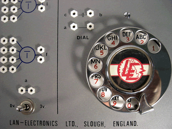  image of Rotary telephone dial (notice the letters missing? 