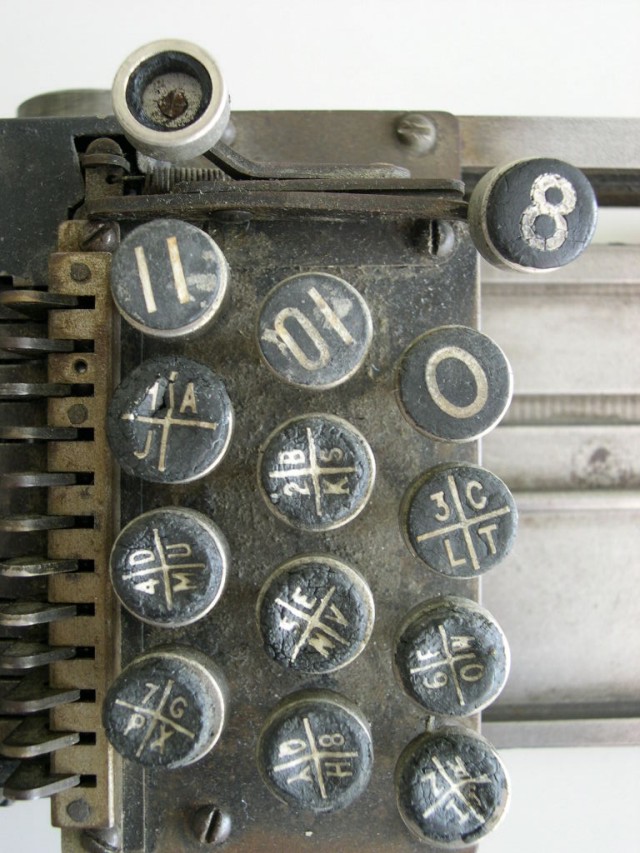 Closeup of the keypad of the British Tabulating Machine Company Type 001 mechanical keypunch (card punch); note how each key has four sections. This rare keypunch was an important part of computer history.